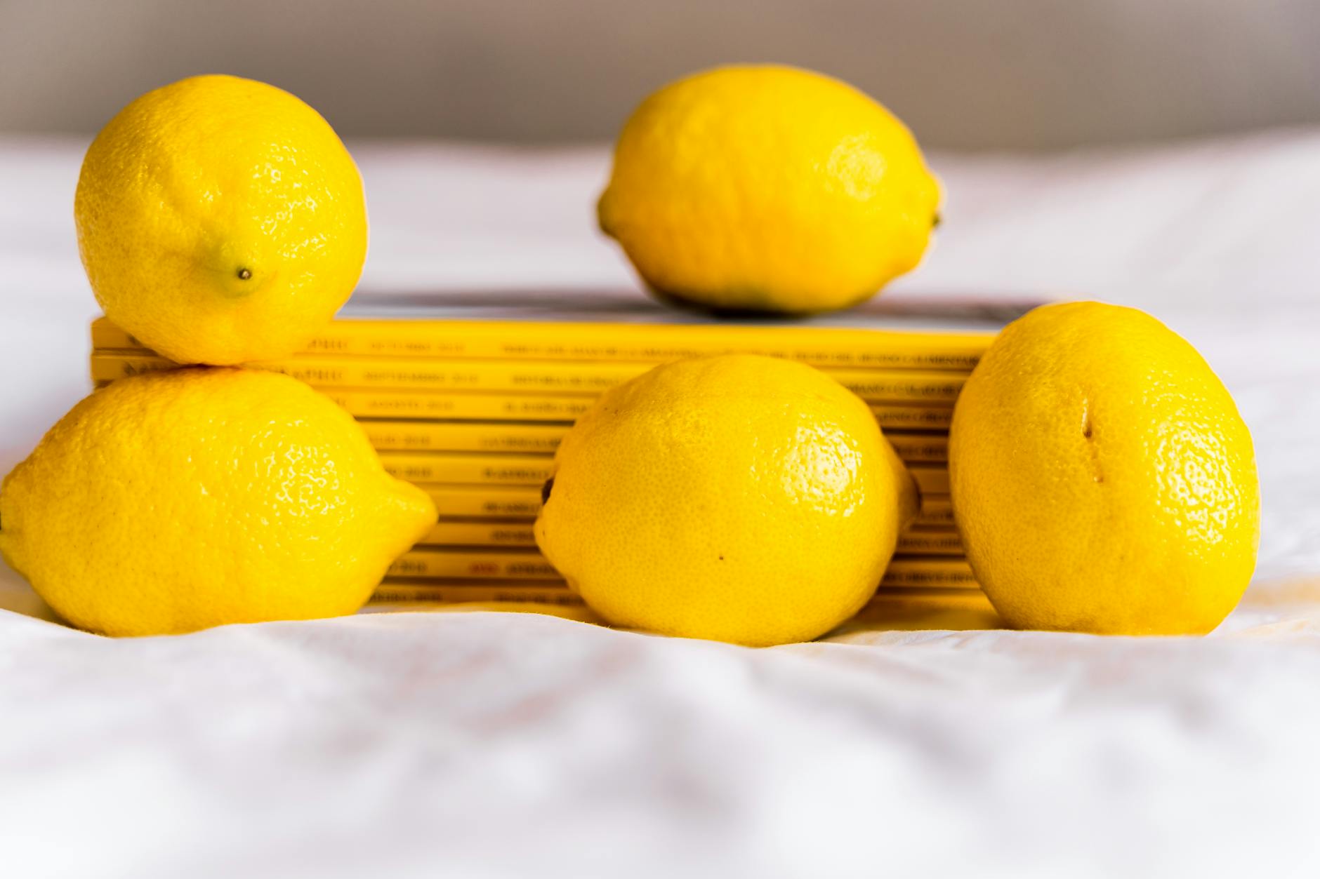 Woman holding lemon vibrators in contemplative moment